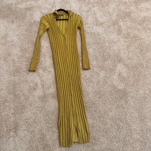 A yellow body con dress